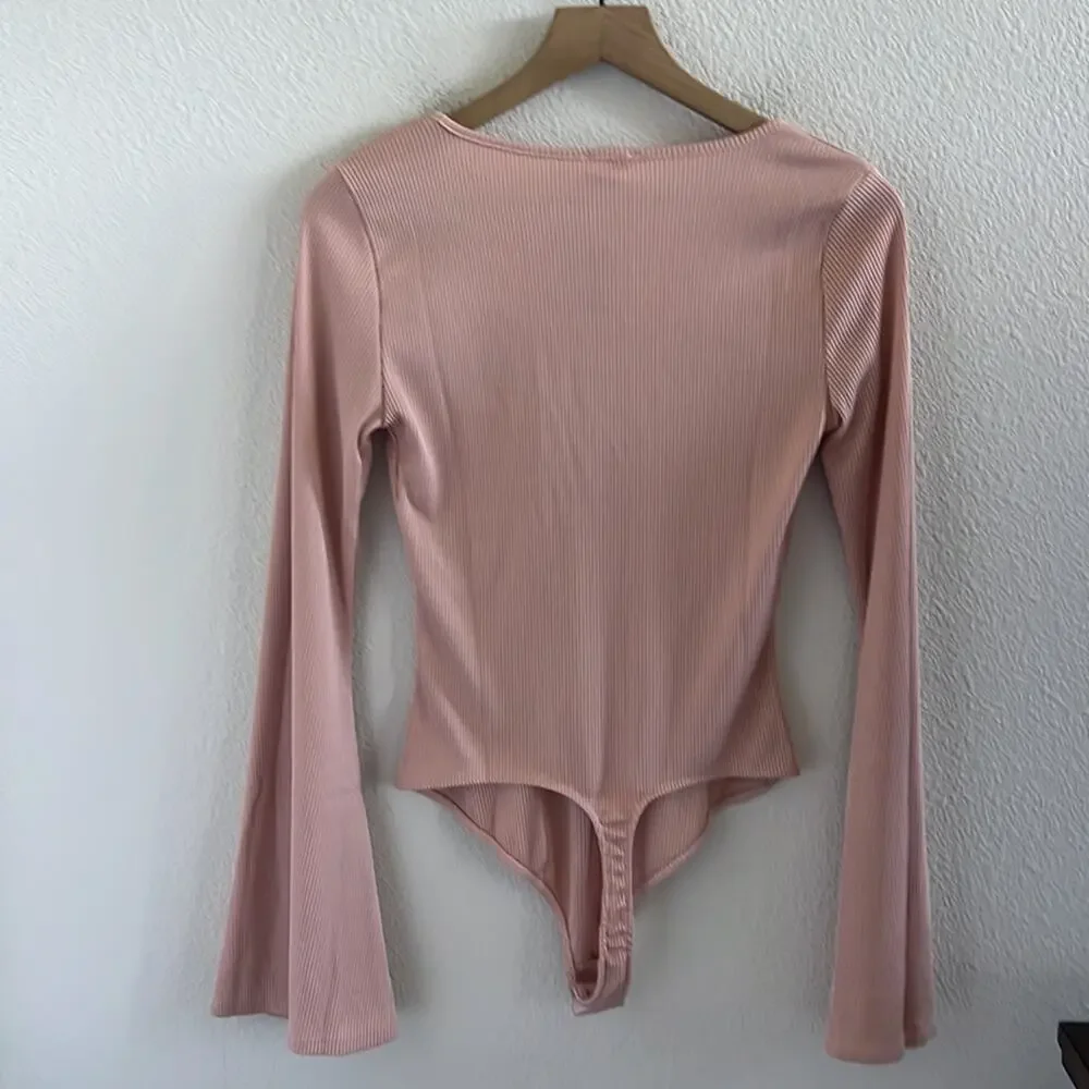NWT Free People Intimately Charli Bodysuit Mini RIbbed Pink Statement Sleeve S